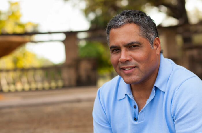 middle-aged man in blue shirt